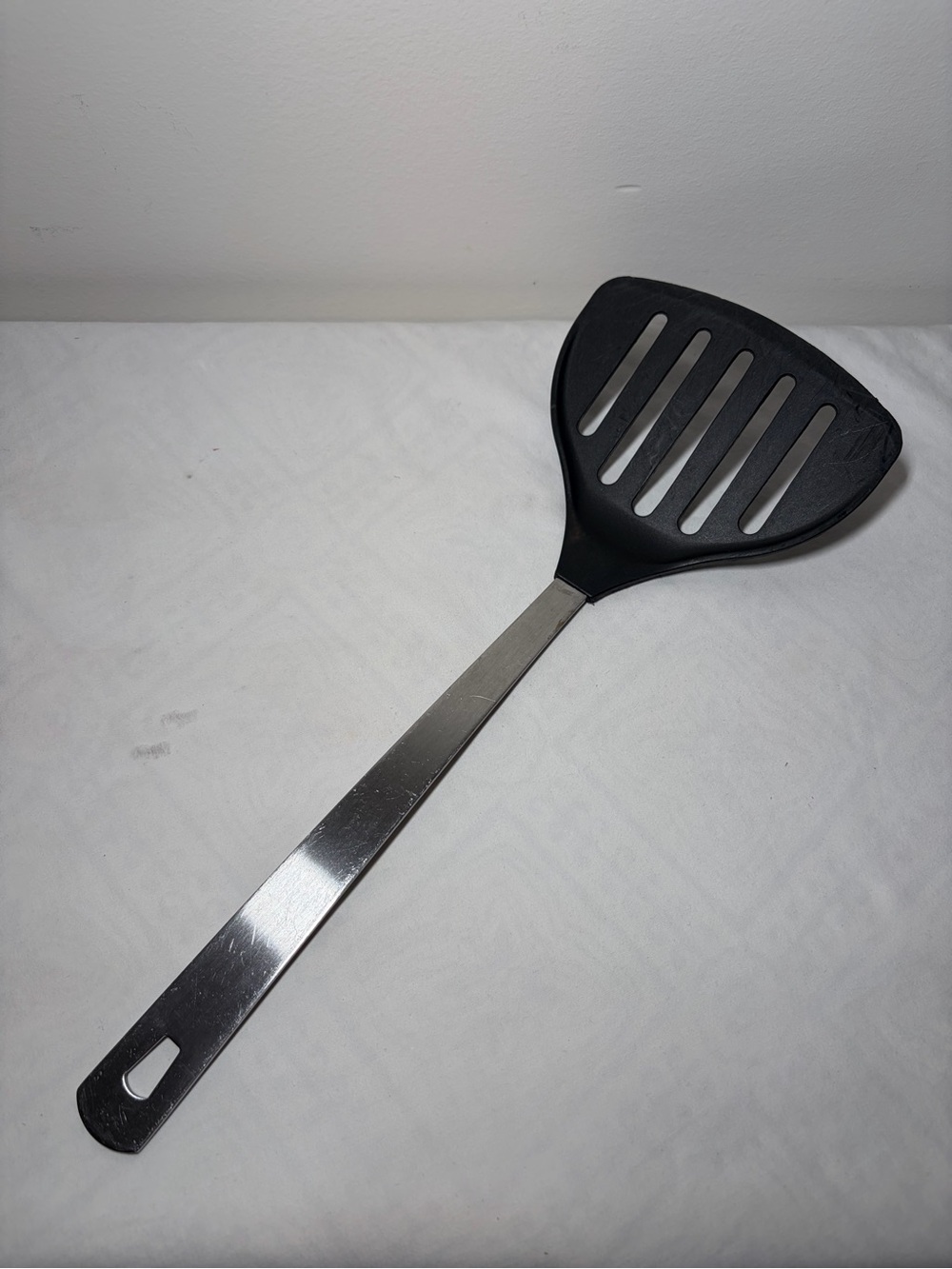 AMCO Black Slotted Turner Spatula with Stainless Steel Handle